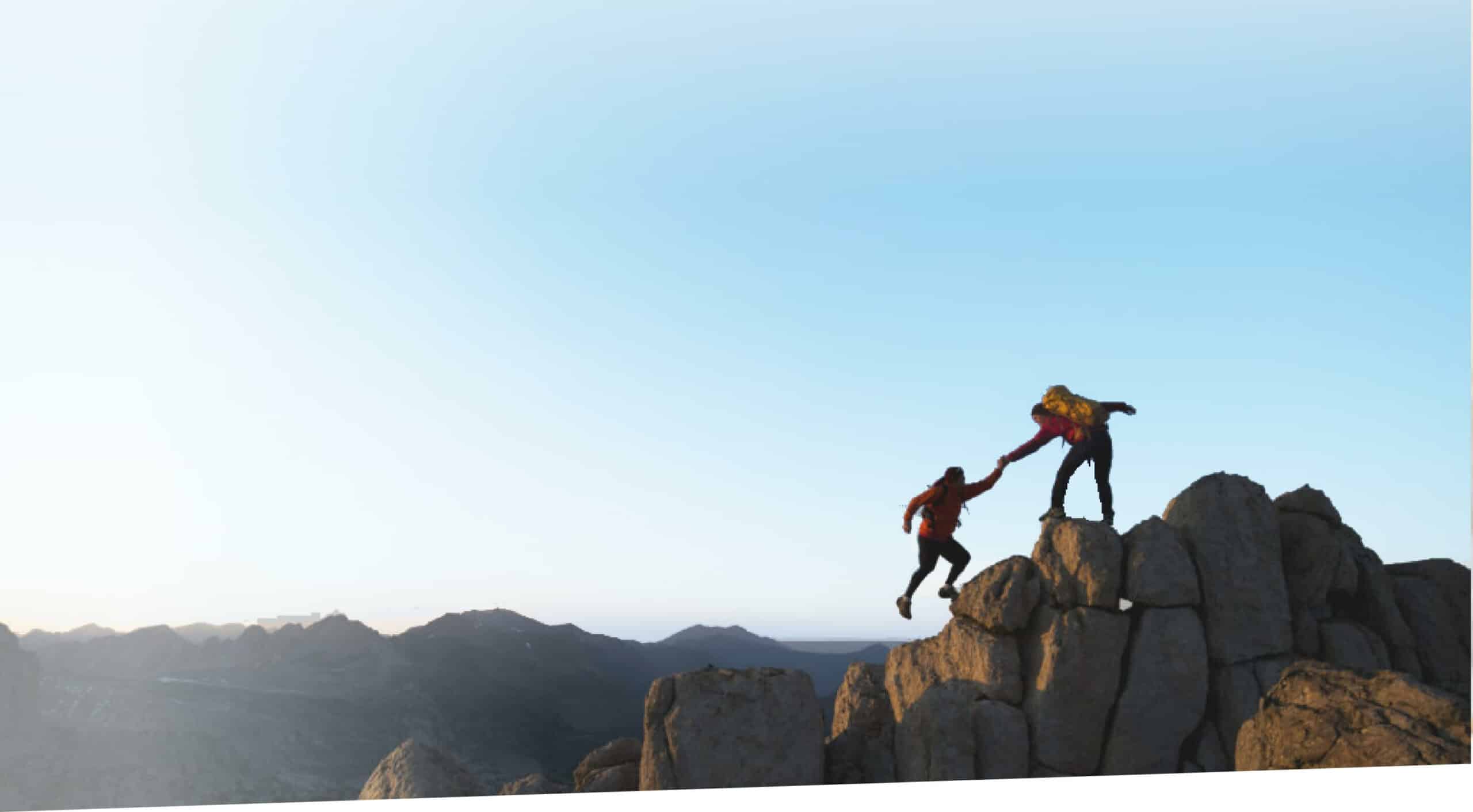 Wealth Planning Resources - couple climbing and helping each other